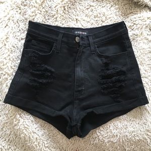 Distressed black shorts